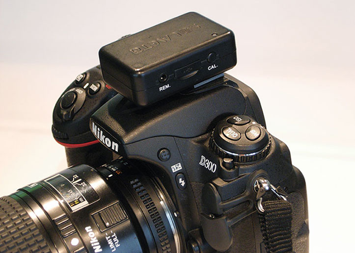 Solmeta Geotagger on top of Nikon D300